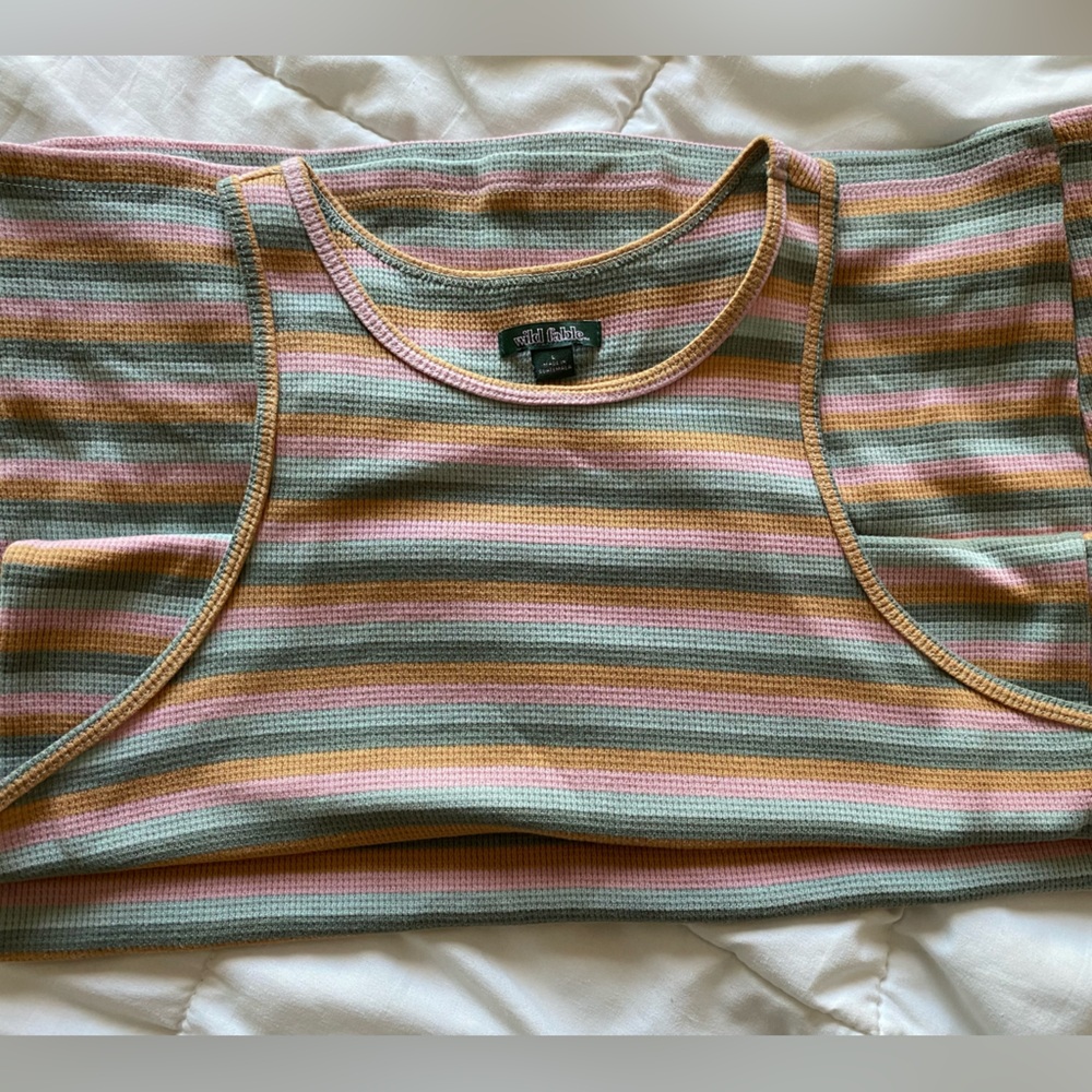 Cute striped tank body con dress material is stretchy